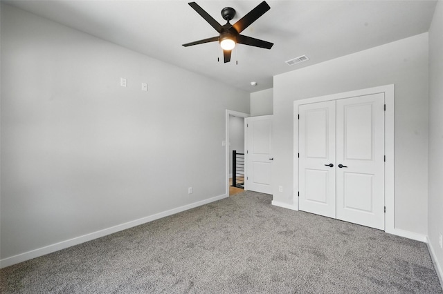 1901 Varsity Dr, Grand Prairie, TX 75051 - unfurnished bedroom featuring carpet, baseboards, a closet, and ceiling fan