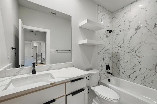 1901 Varsity Dr, Grand Prairie, TX 75051 - bathroom featuring vanity, toilet, and bathtub / shower combination