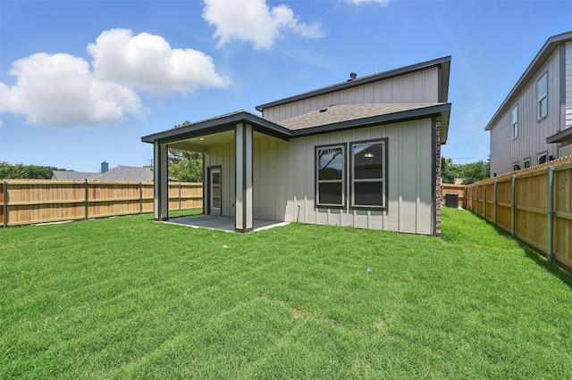1901 Varsity Dr, Grand Prairie, TX 75051 - back of house featuring board and batten siding and a patio area