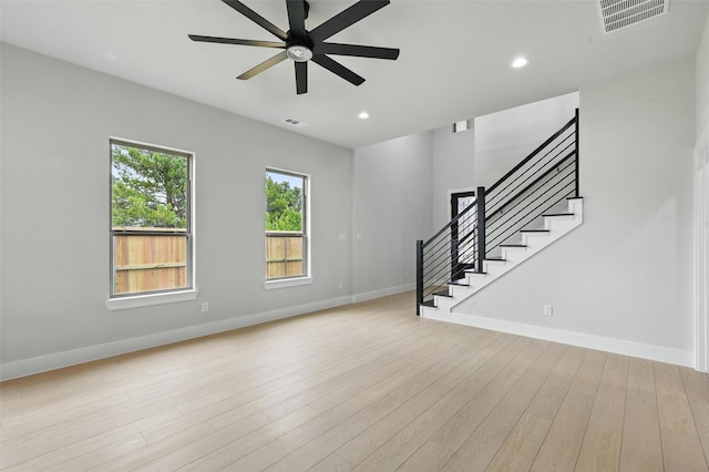 1901 Varsity Dr, Grand Prairie, TX 75051 - unfurnished living room featuring stairway, baseboards, ceiling fan, recessed lighting, and light wood-type flooring