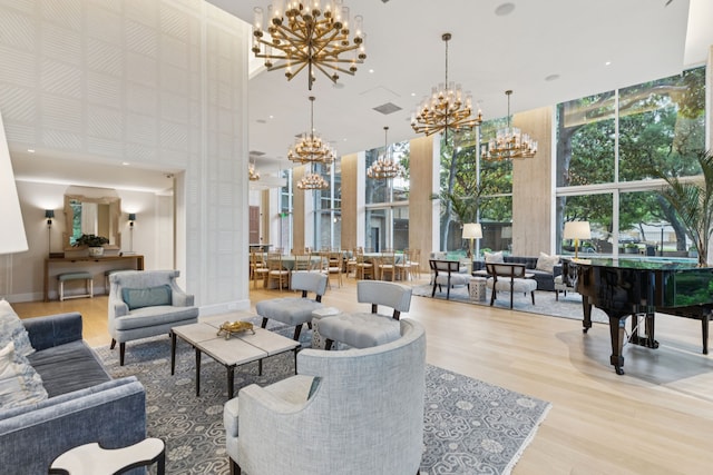 3525 Turtle Creek Blvd Unit 12A, Dallas, TX 75219 - common area featuring a towering ceiling and a wall of windows