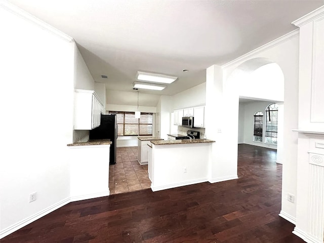 6408 Townsend Ln, Plano, TX 75024 - kitchen with appliances with stainless steel finishes, white cabinetry, dark wood-style floors, baseboards, and crown molding