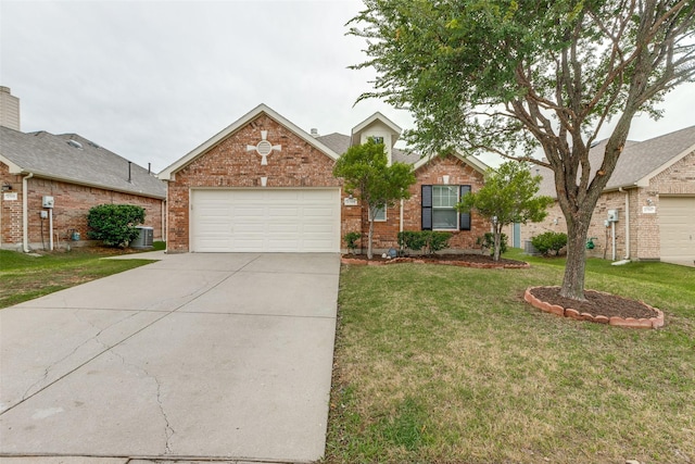 2704 Calmwater Dr, Little Elm, TX 75068 - traditional home featuring an attached garage, brick siding, driveway, central air condition unit, and a front yard