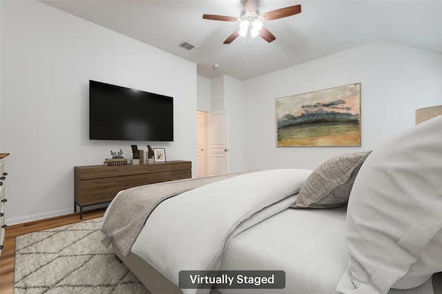 2704 Calmwater Dr, Little Elm, TX 75068 - bedroom featuring wood finished floors, baseboards, ceiling fan, and vaulted ceiling
