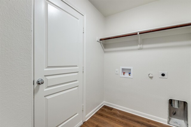 2704 Calmwater Dr, Little Elm, TX 75068 - washroom with hookup for a gas dryer, electric dryer hookup, dark wood-type flooring, hookup for a washing machine, and baseboards