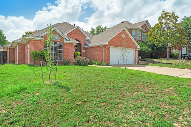 7816 Blossom Dr, Fort Worth, TX 76133 - view of front of property with brick siding, driveway, a garage, and a shingled roof