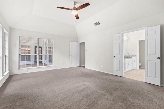 7816 Blossom Dr, Fort Worth, TX 76133 - unfurnished bedroom featuring light colored carpet, a sink, ensuite bathroom, baseboards, and light tile patterned flooring