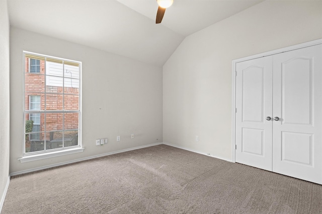 7816 Blossom Dr, Fort Worth, TX 76133 - unfurnished bedroom with carpet flooring, lofted ceiling, baseboards, ceiling fan, and a closet
