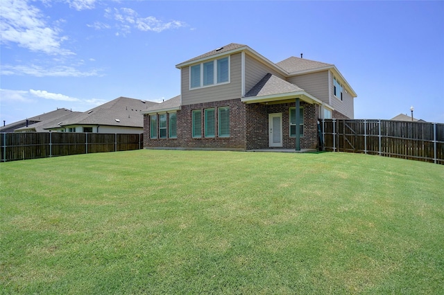 2612 Dancing Flame Dr, Denton, TX 76201 - rear view of property with brick siding and a shingled roof