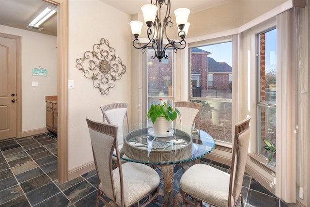 6619 Crestmoor Ln, Sachse, TX 75048 - dining space with a chandelier and baseboards