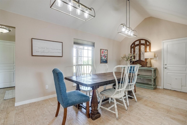 112 Tigers Eye Ct, Weatherford, TX 76087 - dining room featuring vaulted ceiling, light wood-type flooring, baseboards, and a chandelier