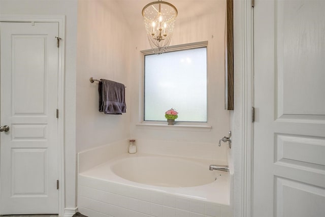 112 Tigers Eye Ct, Weatherford, TX 76087 - full bath featuring a garden tub and a chandelier