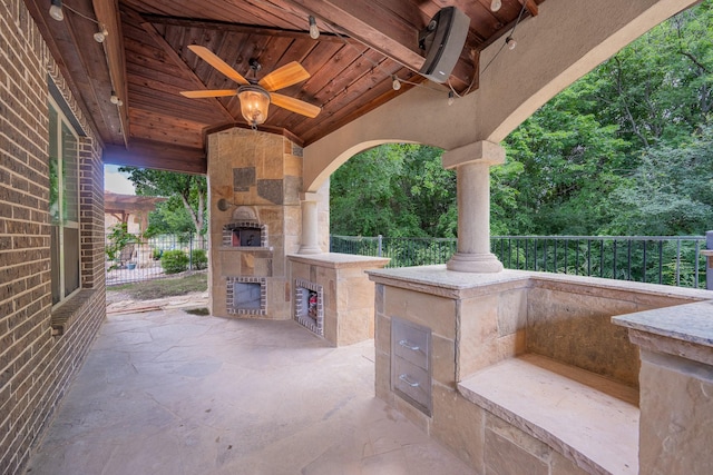 3548 Tuscan Hills Cir, Denton, TX 76210 - view of patio / terrace featuring a fireplace and ceiling fan