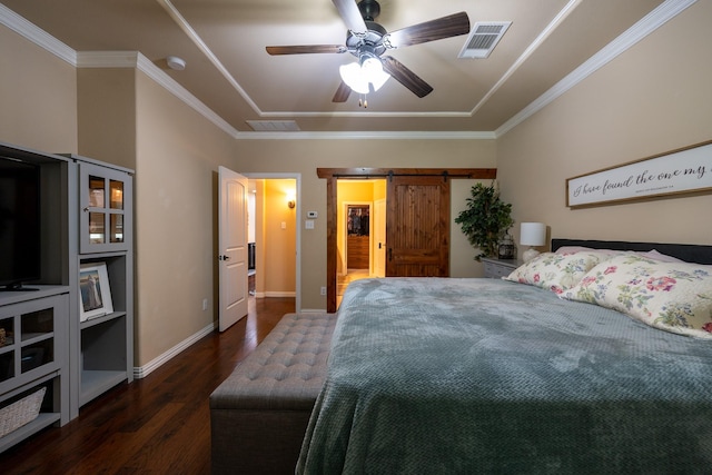 3548 Tuscan Hills Cir, Denton, TX 76210 - bedroom featuring wood finished floors, a raised ceiling, baseboards, ornamental molding, and a barn door
