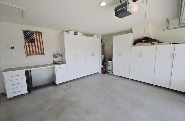 165 Cattlemans Creek Rd W, Newark, TX 76071 - garage featuring a garage door opener and an office area