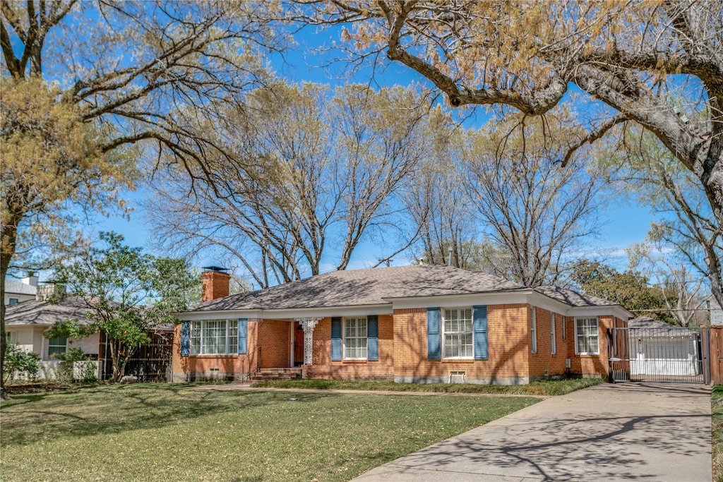 6311 Del Norte Ln, Dallas, TX 75225 - ranch-style home with a gate, brick siding, a chimney, driveway, and a garage