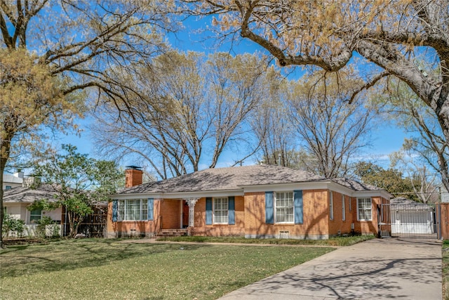 6311 Del Norte Ln, Dallas, TX 75225 - ranch-style home with a gate, brick siding, a chimney, driveway, and a garage