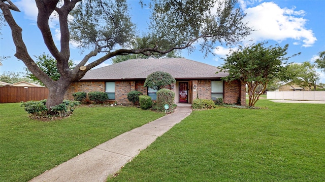 1931 Crestside Cir, Carrollton, TX 75007 - view of front of property featuring brick siding and a shingled roof