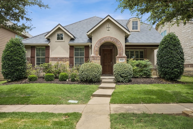 8100 Delaware Dr, Mckinney, TX 75070 - view of front facade with stucco siding, a front yard, and a high end roof