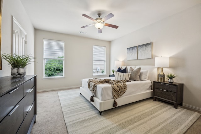 8100 Delaware Dr, Mckinney, TX 75070 - bedroom featuring baseboards, light carpet, and a ceiling fan