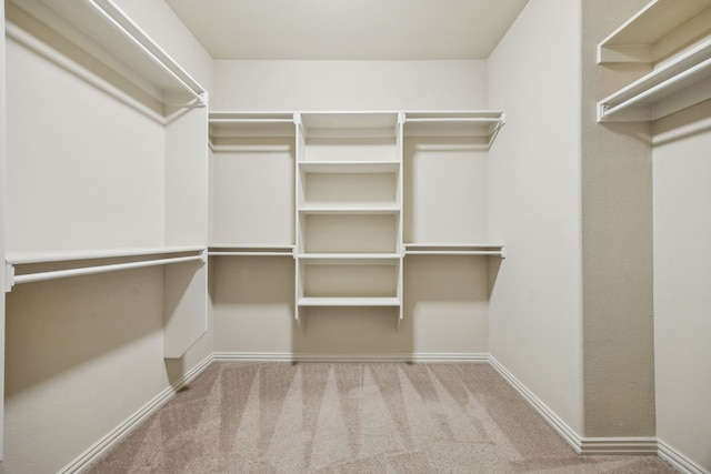 8100 Delaware Dr, Mckinney, TX 75070 - walk in closet featuring carpet