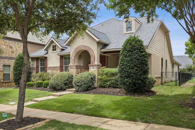 8100 Delaware Dr, Mckinney, TX 75070 - view of front facade featuring stone siding and stucco siding
