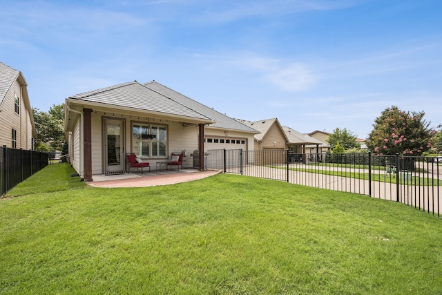 8100 Delaware Dr, Mckinney, TX 75070 - rear view of house featuring an attached garage, concrete driveway, and a patio