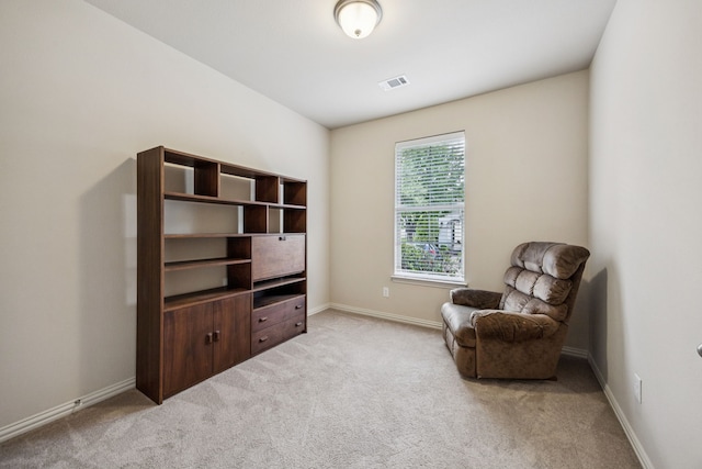 8100 Delaware Dr, Mckinney, TX 75070 - living area featuring light carpet and baseboards