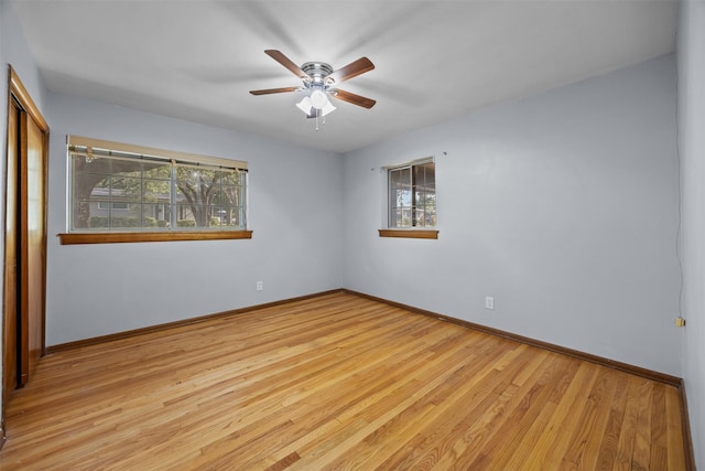 3212 Medina Ave, Fort Worth, TX 76133 - spare room with wood finished floors, baseboards, and ceiling fan