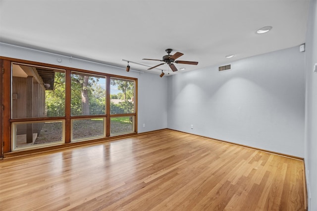 3212 Medina Ave, Fort Worth, TX 76133 - spare room with ceiling fan, light wood-style floors, baseboards, and recessed lighting