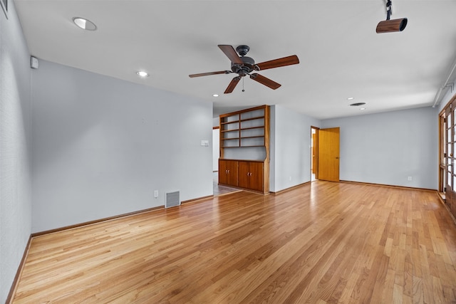 3212 Medina Ave, Fort Worth, TX 76133 - spare room with light wood-type flooring, a ceiling fan, recessed lighting, and baseboards