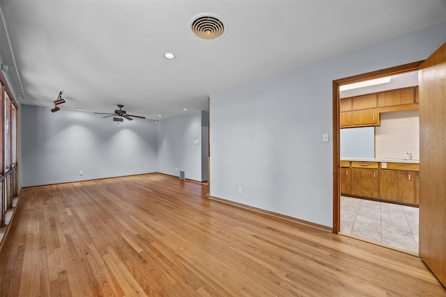3212 Medina Ave, Fort Worth, TX 76133 - empty room featuring a ceiling fan, light wood-style flooring, and recessed lighting