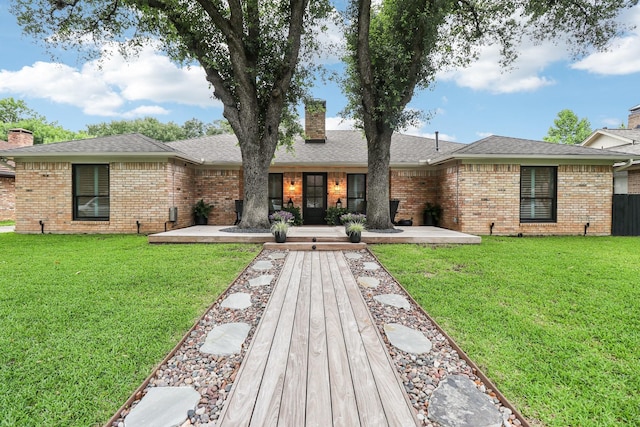 1510 Waltham Ct, Arlington, TX 76012 - ranch-style house with a chimney, brick siding, and a front lawn