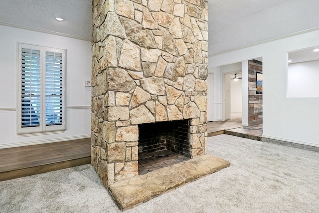 1510 Waltham Ct, Arlington, TX 76012 - unfurnished living room featuring a fireplace, baseboards, ornamental molding, and a textured ceiling