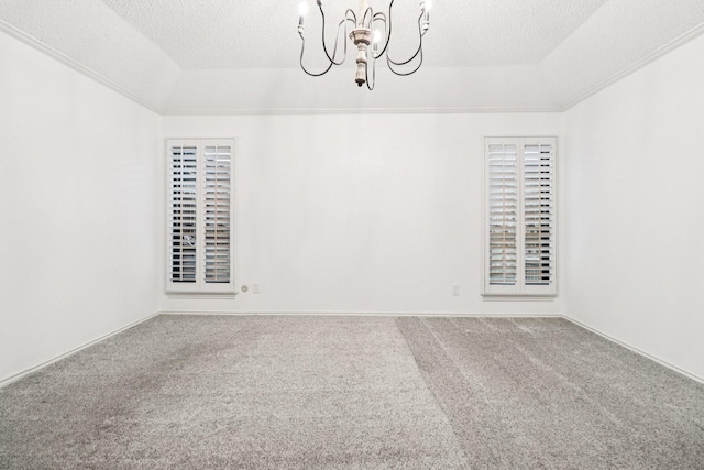 1510 Waltham Ct, Arlington, TX 76012 - empty room featuring a textured ceiling, a chandelier, carpet, and a raised ceiling