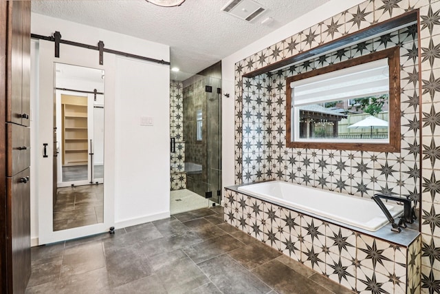 1510 Waltham Ct, Arlington, TX 76012 - full bathroom featuring a garden tub, a stall shower, and a textured ceiling