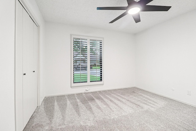 1510 Waltham Ct, Arlington, TX 76012 - unfurnished bedroom featuring carpet floors, a closet, a textured ceiling, a ceiling fan, and baseboards
