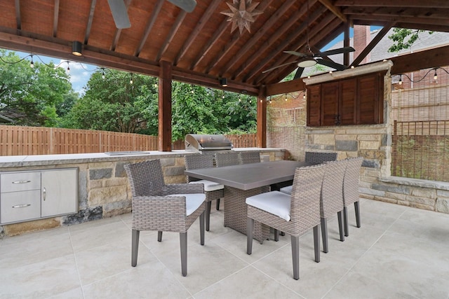 1510 Waltham Ct, Arlington, TX 76012 - view of patio / terrace with an outdoor kitchen, a ceiling fan, and a bar