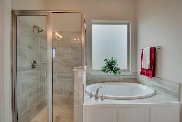 7514 Harbor Dr, Rowlett, TX 75088 - full bathroom featuring a garden tub and a shower stall