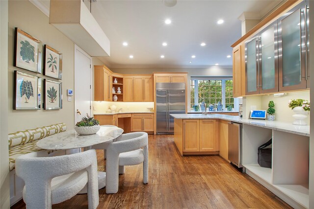 3649 Haynie Ave, University Park, TX 75205 - kitchen with appliances with stainless steel finishes, light brown cabinetry, crown molding, open shelves, and light wood-type flooring