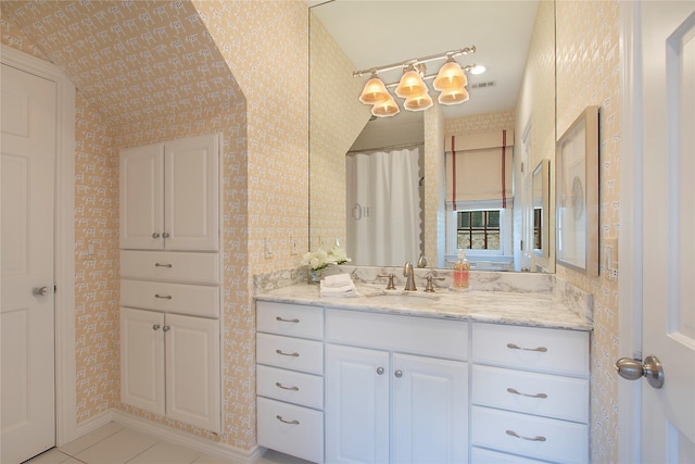 3649 Haynie Ave, University Park, TX 75205 - full bathroom with wallpapered walls, vanity, and tile patterned floors
