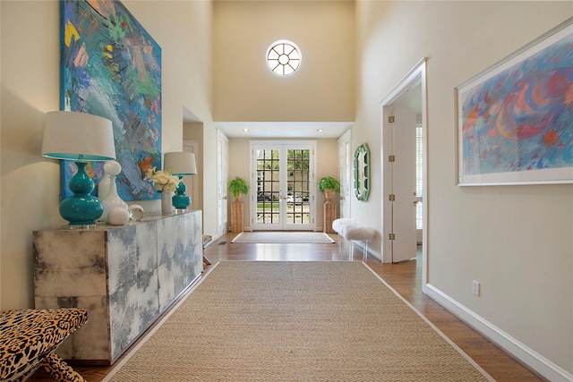 3649 Haynie Ave, University Park, TX 75205 - foyer featuring wood finished floors, french doors, and baseboards