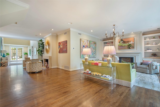 3649 Haynie Ave, University Park, TX 75205 - living area with a fireplace, wood finished floors, a chandelier, baseboards, and recessed lighting