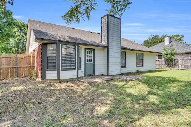 36 Atlantic Ave, Midlothian, TX 76065 - back of property featuring a chimney, a patio, and roof with shingles