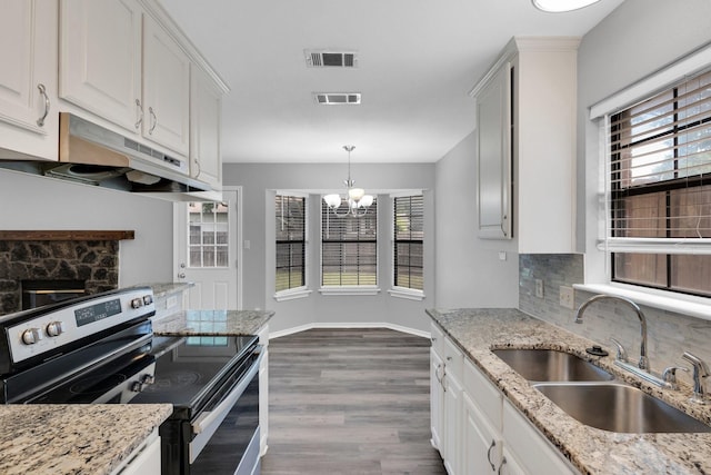 36 Atlantic Ave, Midlothian, TX 76065 - kitchen with stainless steel range with electric cooktop, a sink, under cabinet range hood, backsplash, and dark wood-type flooring