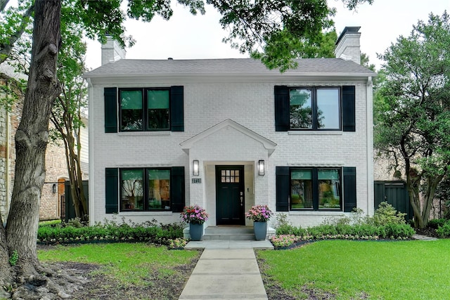 3710 Binkley Ave, University Park, TX 75205 - view of front of home with a chimney and brick siding