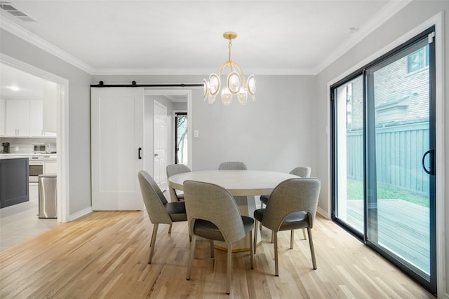 3710 Binkley Ave, University Park, TX 75205 - dining space with light wood finished floors, ornamental molding, a barn door, baseboards, and a chandelier