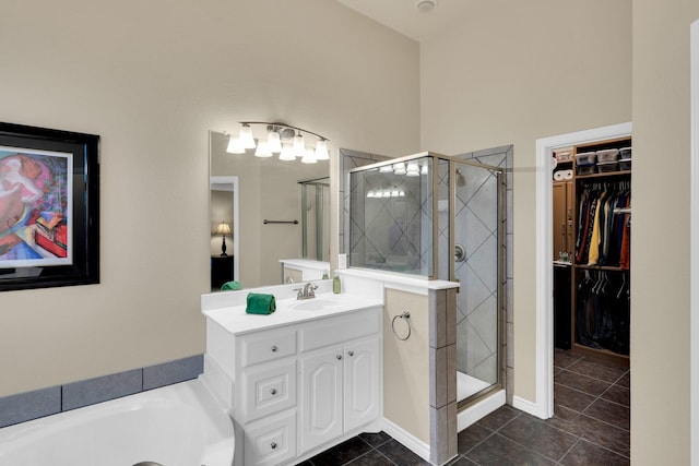 5210 Medallion Ct, Midlothian, TX 76065 - full bathroom featuring vanity, a shower stall, tile patterned flooring, and a spacious closet