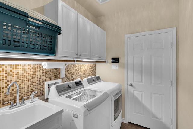5210 Medallion Ct, Midlothian, TX 76065 - laundry area with washer and dryer and cabinet space