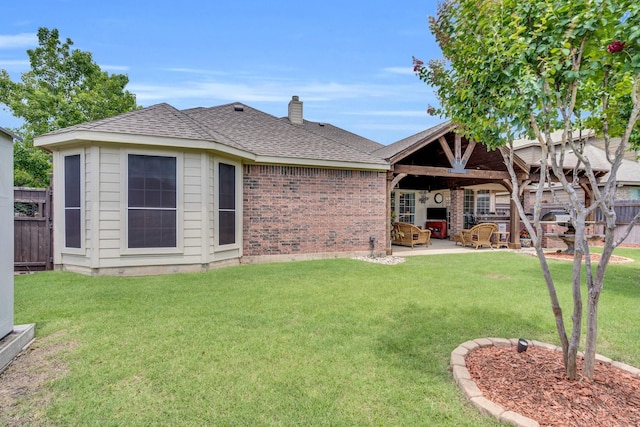 5210 Medallion Ct, Midlothian, TX 76065 - view of front of house featuring a patio area, a chimney, roof with shingles, and brick siding